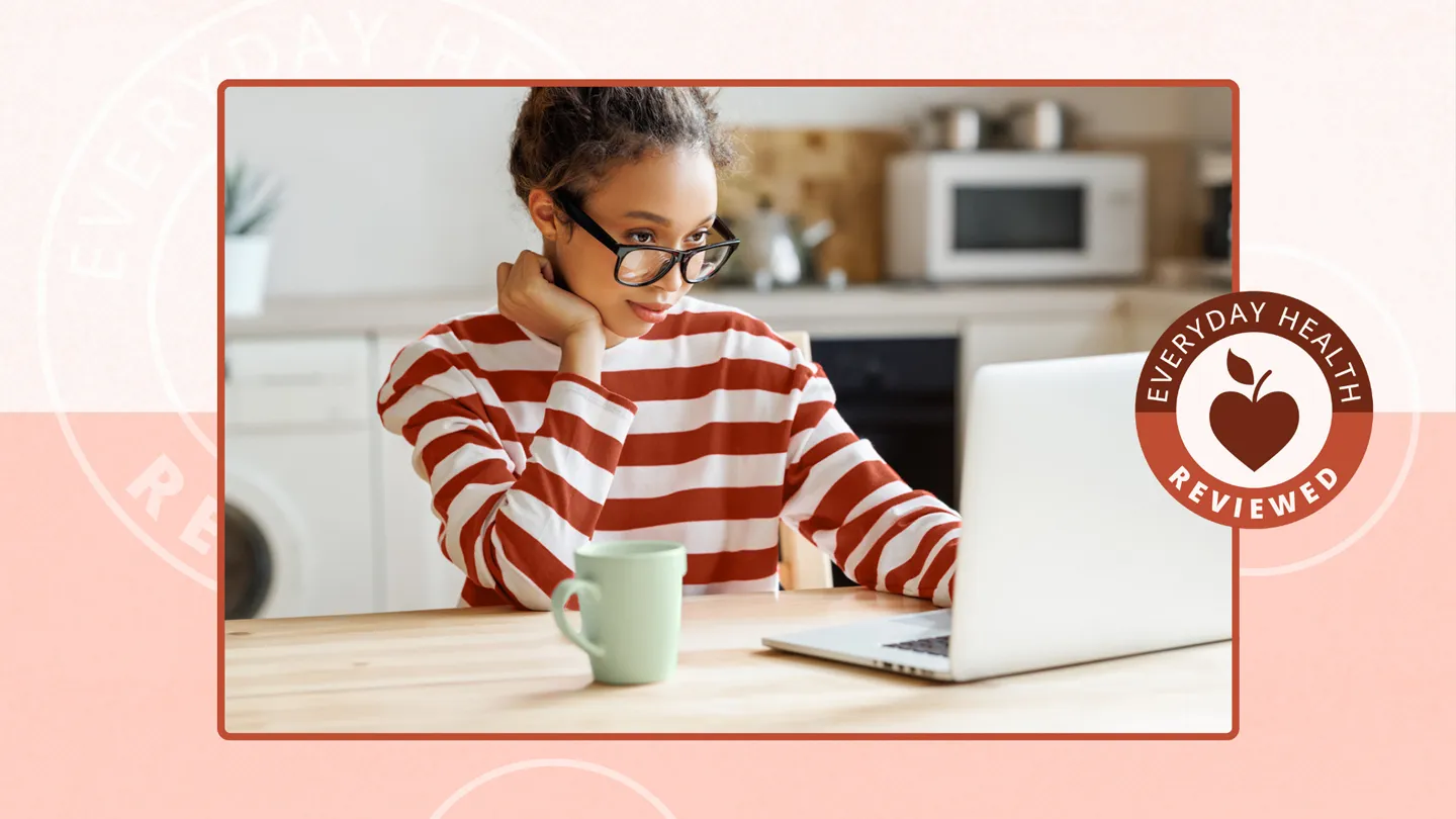 young woman in online therapy session at home