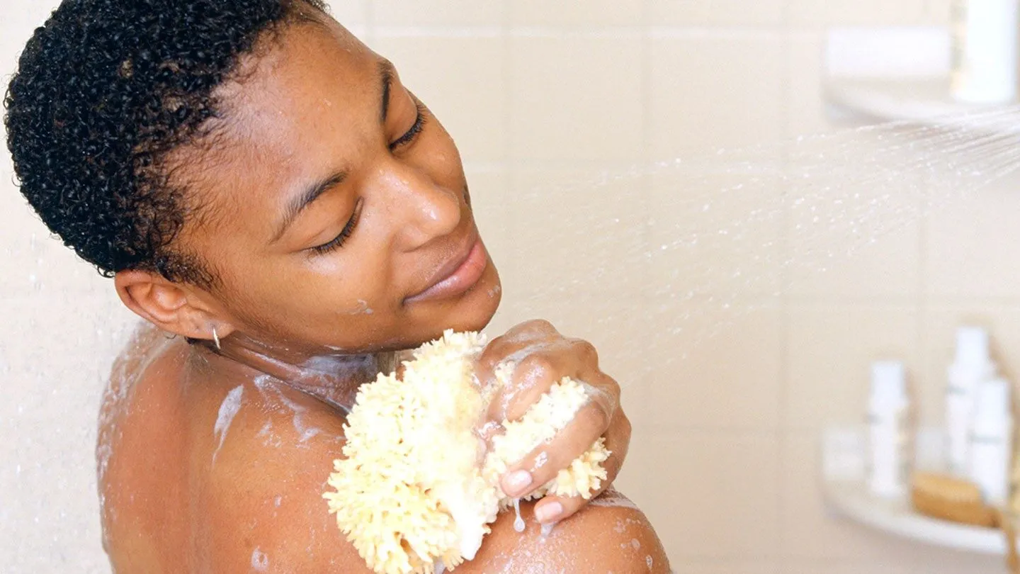 a woman with allergies showering