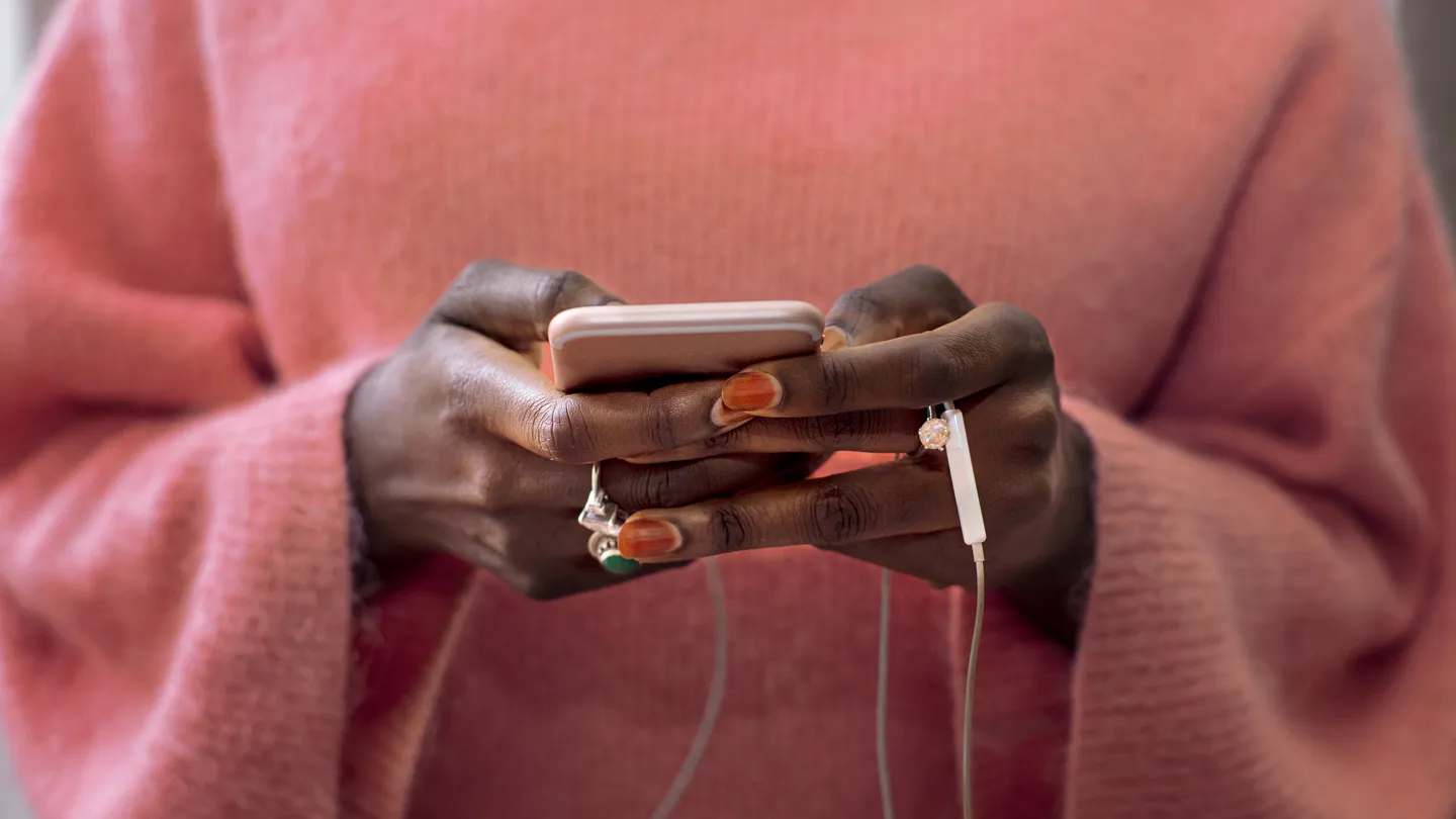 woman holding smart phone