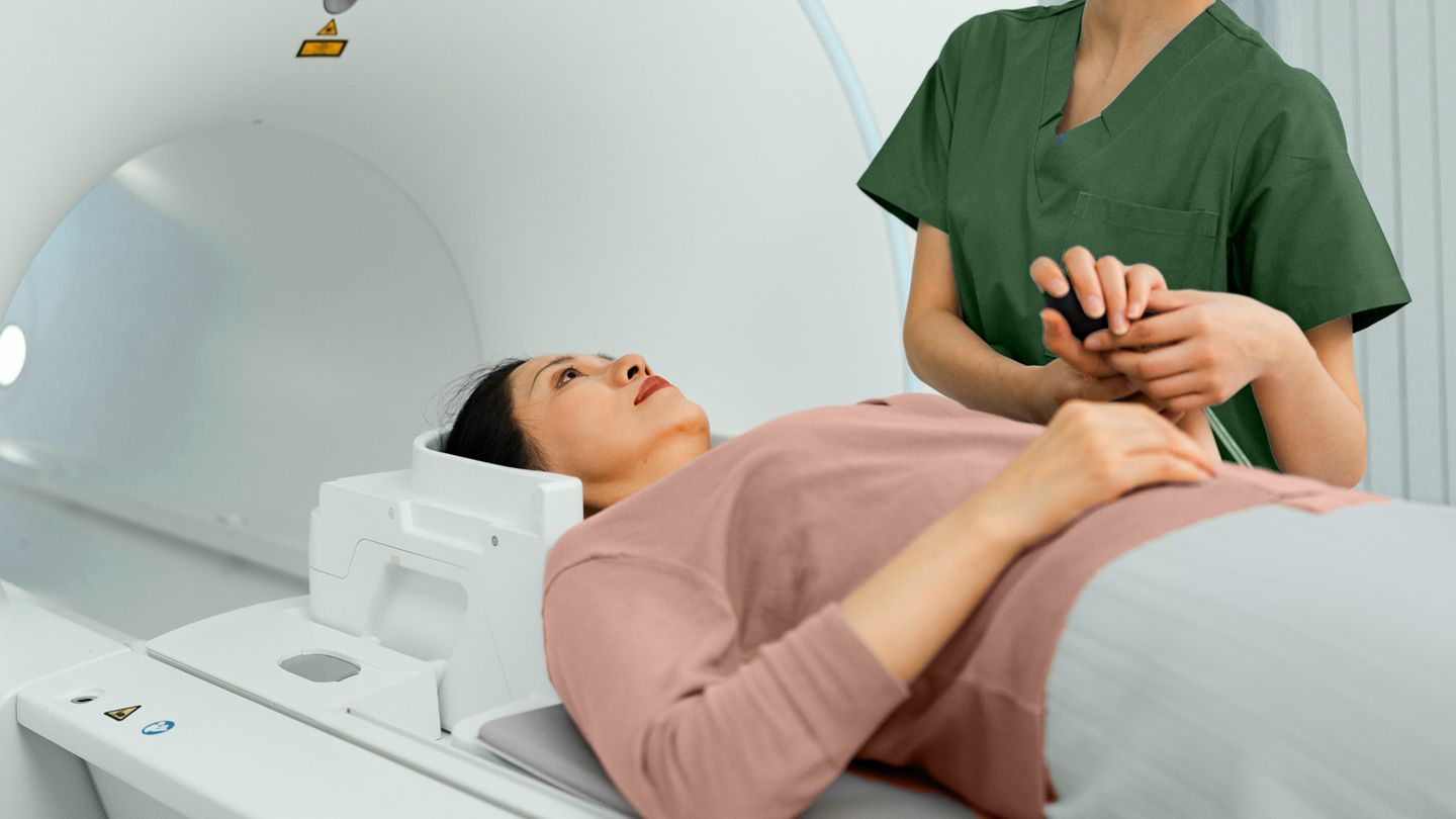 Asian woman getting an MRI