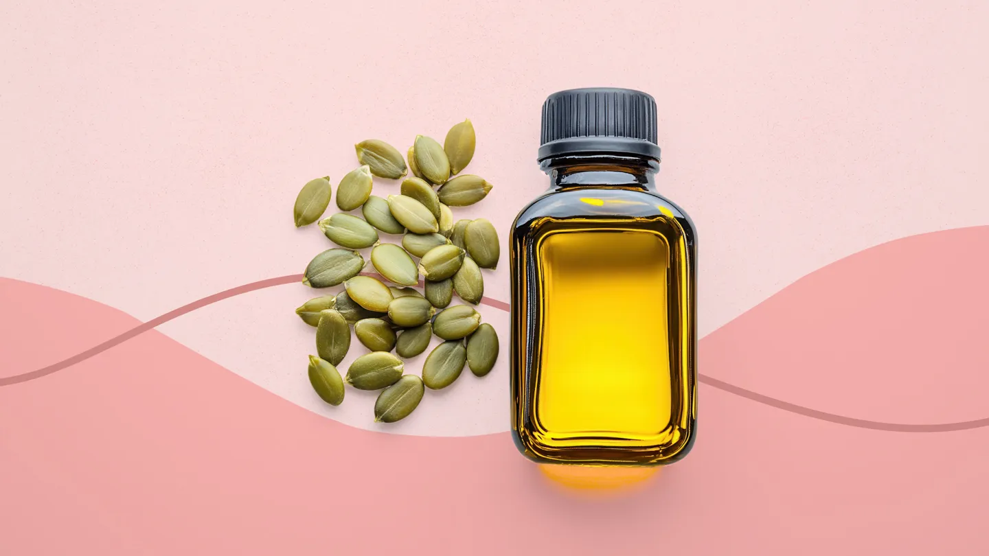 pumpkin seed oil bottle and pumpkin seeds