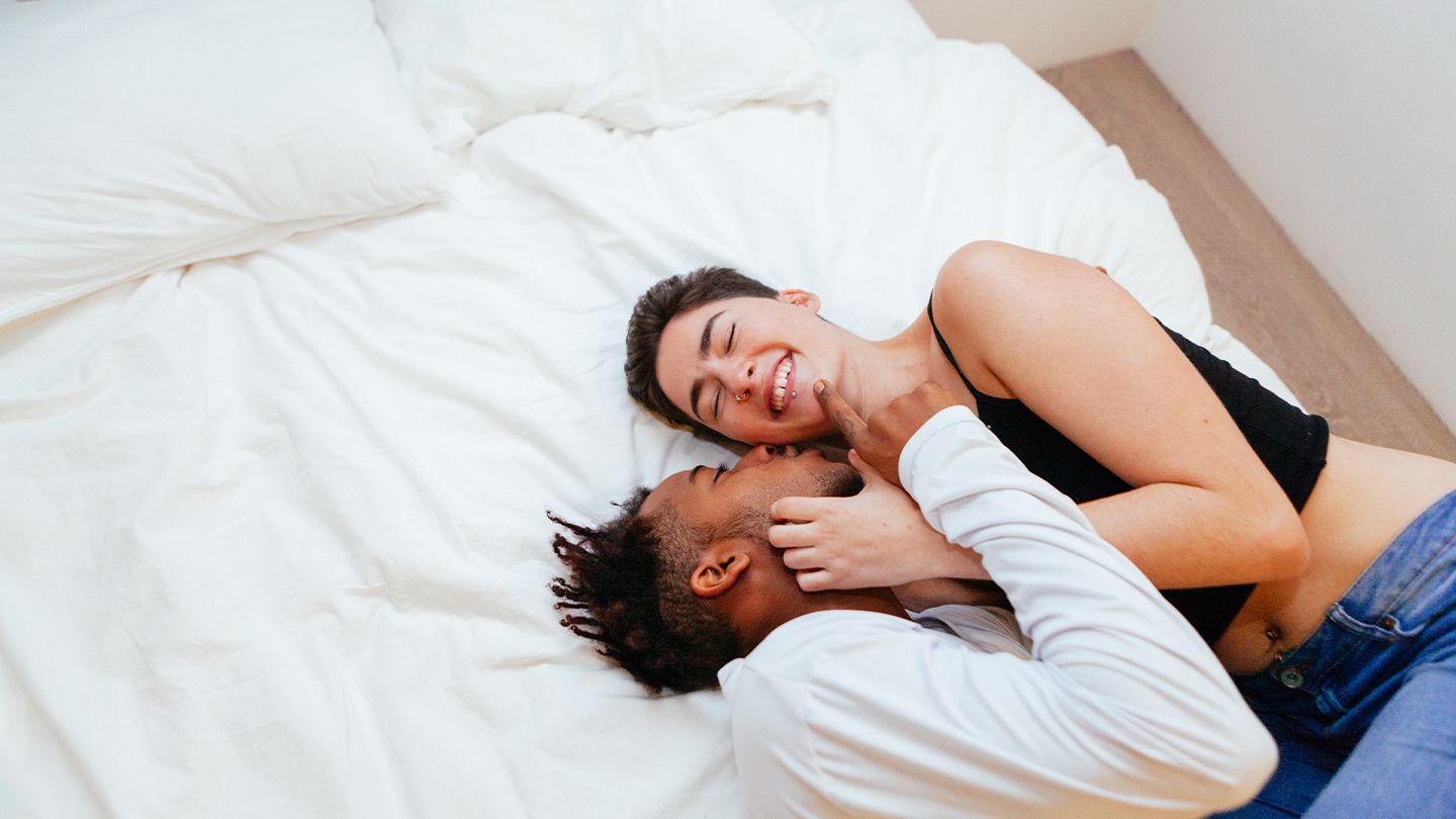 Couple in bed abstinence outercourse