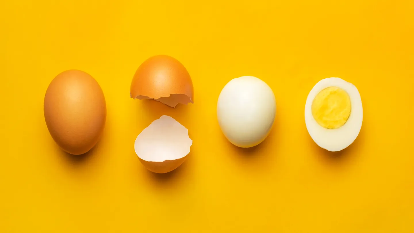 process of boiled egg on yellow