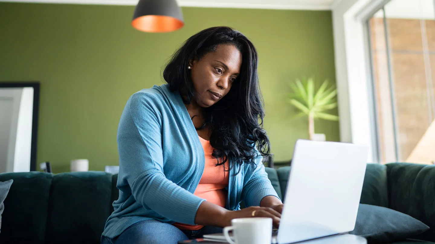 woman on computer at home