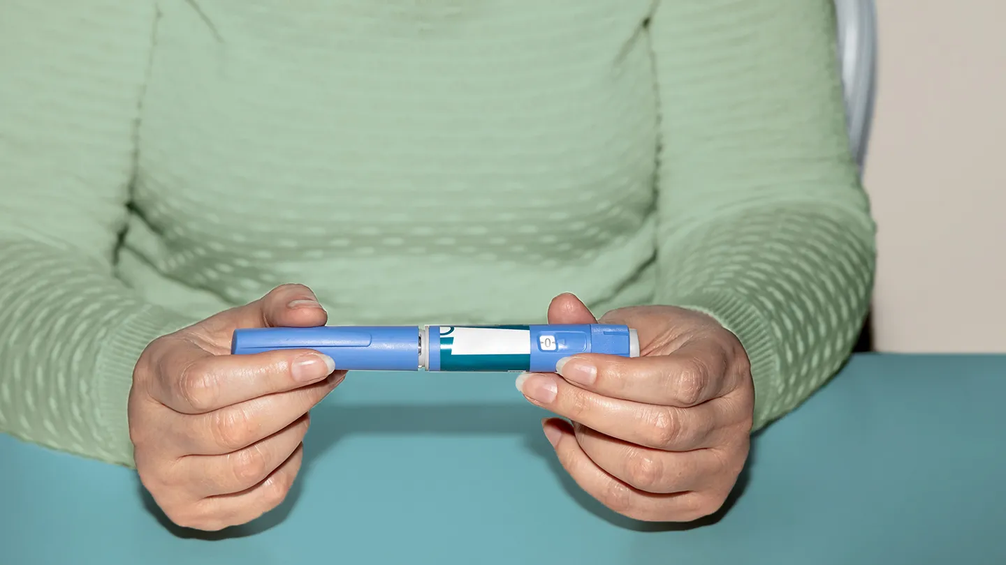 oman holding semaglutide injection pen