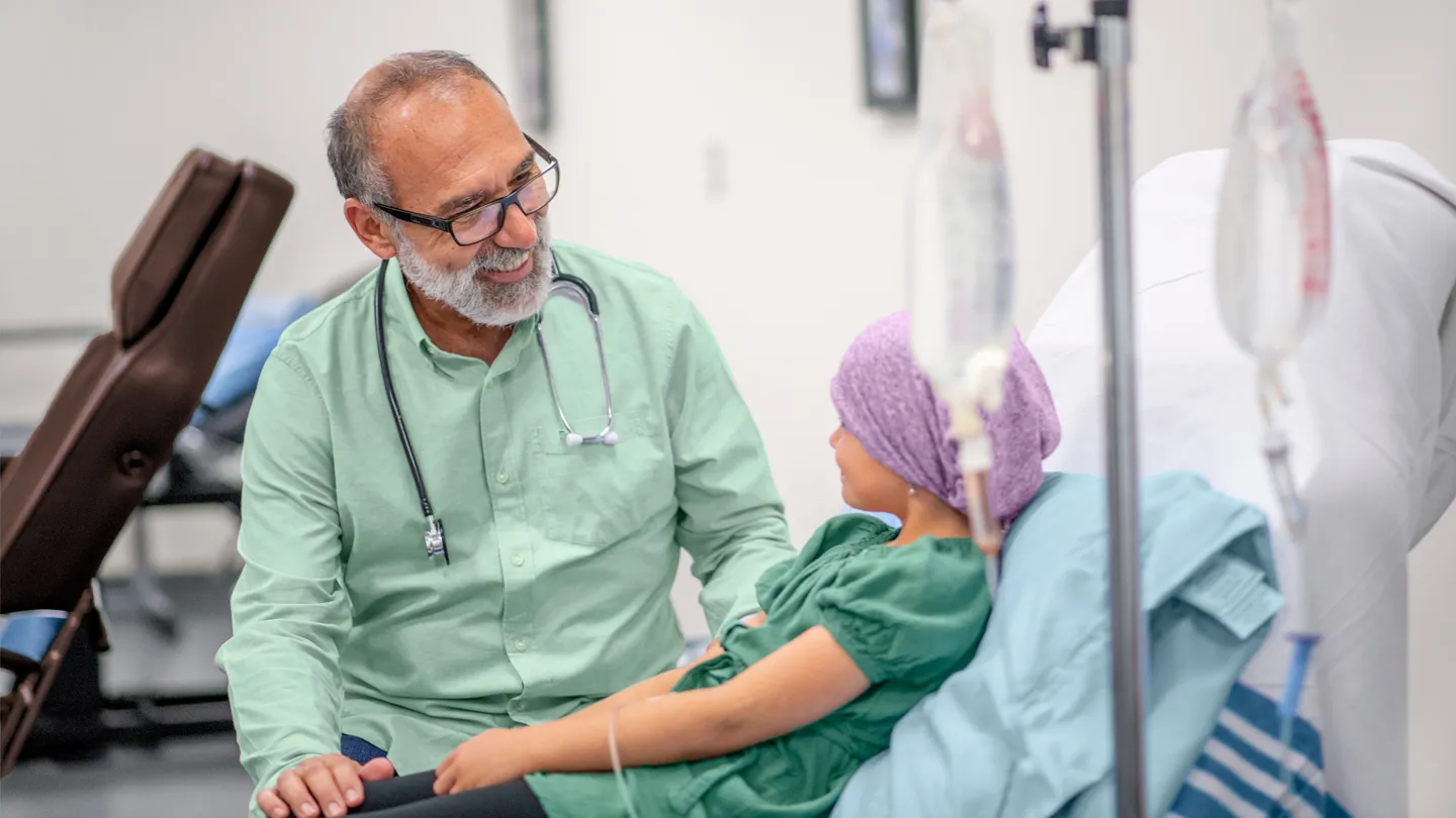 Child Leukemia doctor talking bedside manner pediatric oncologist