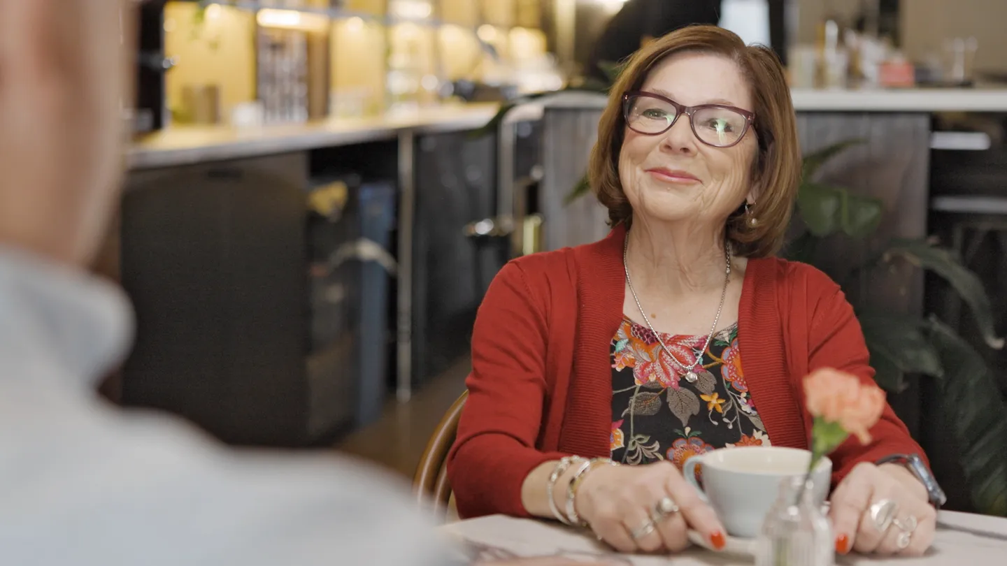 woman talking in restaurant