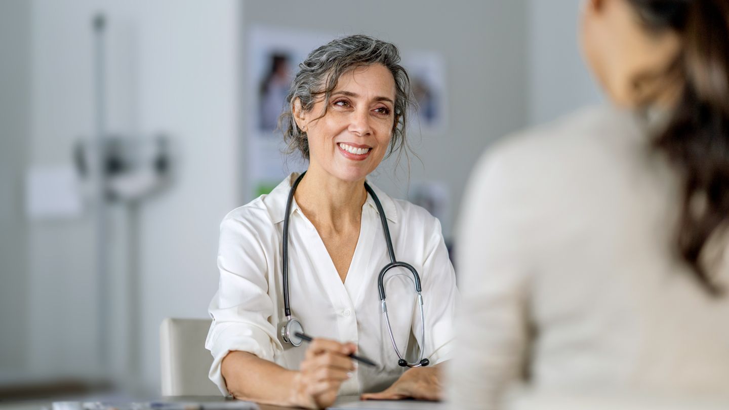 doctor talking with patient