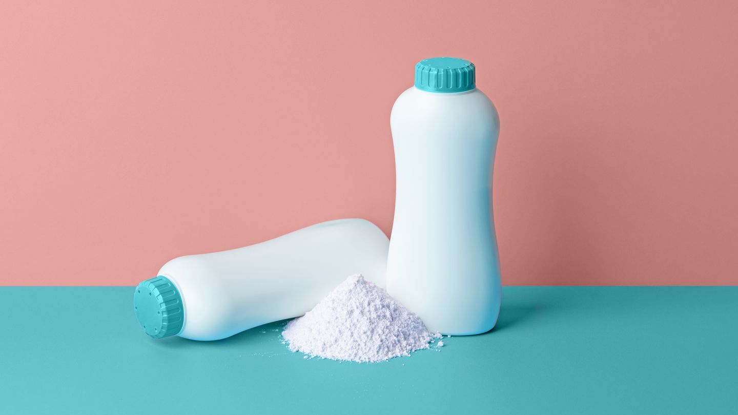 talcum powder bottles and powder still life