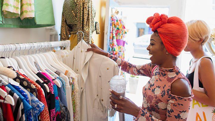 a woman shopping for clothes