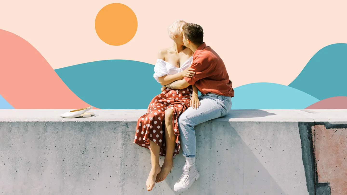 two women kissing on a date