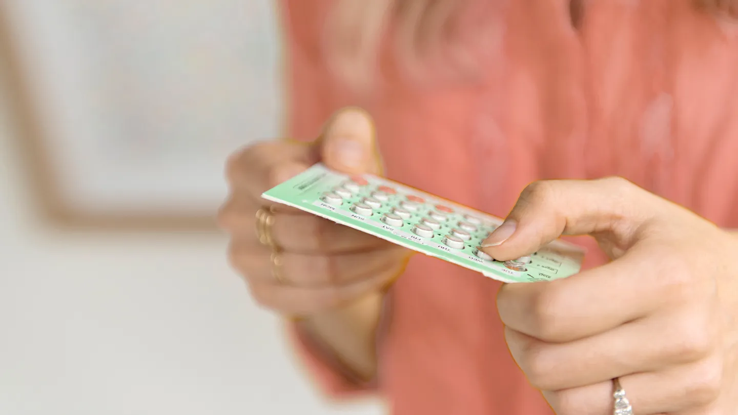 woman taking hormone therapy