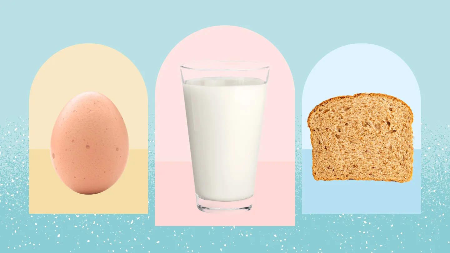 egg a glass of cows milk and piece of wheat bread