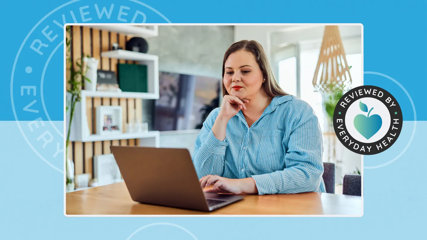 Plus size adult woman on laptop at home