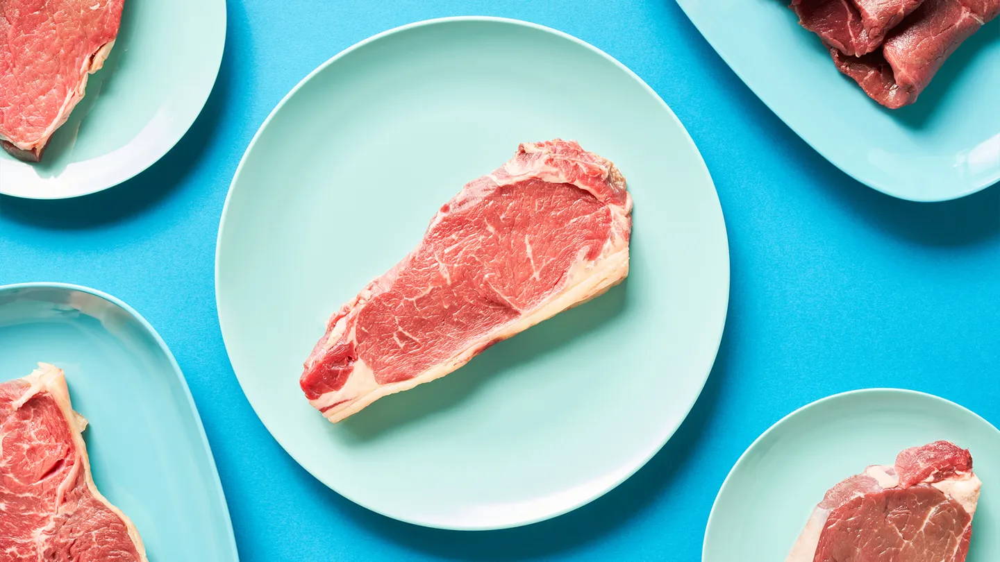 red meat on blue plates