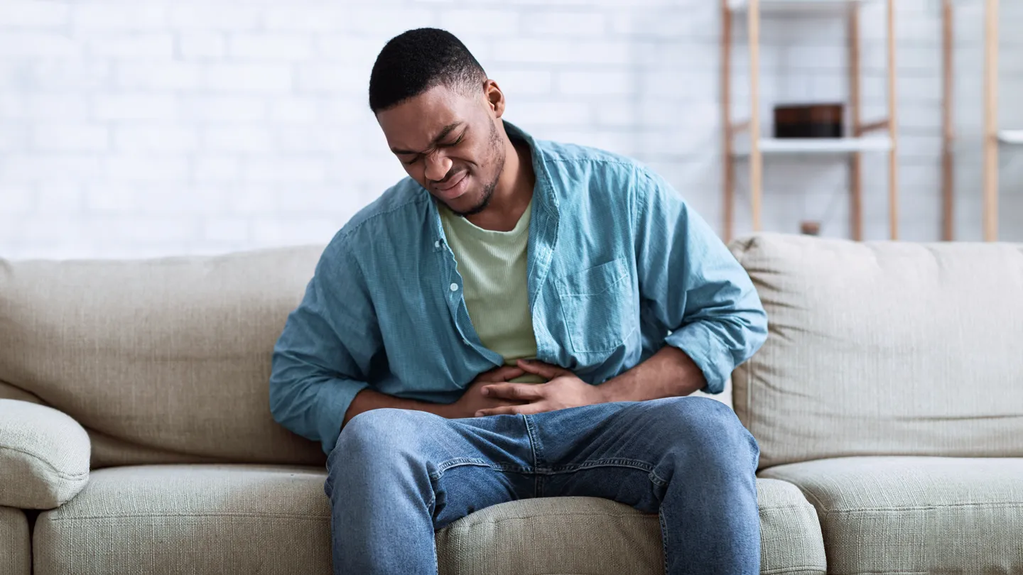 man with gas pain