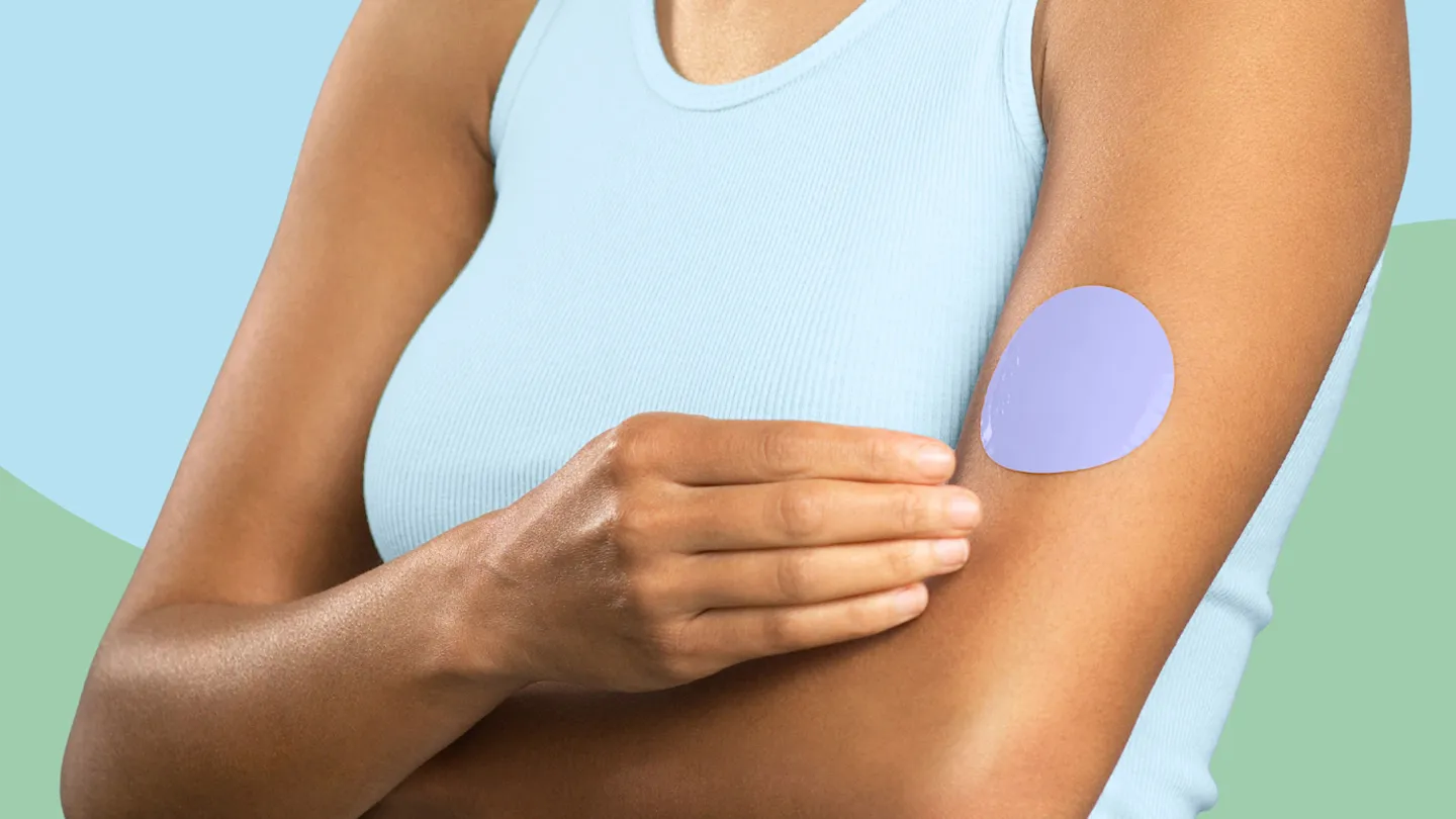 woman wearing a glp-1 patch on her arm