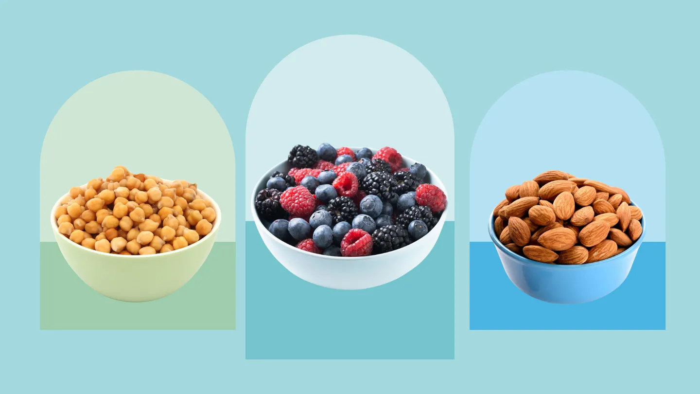bowls of chickpeas mixed berries raspberries blackberries blueberries and almonds in colorful arches