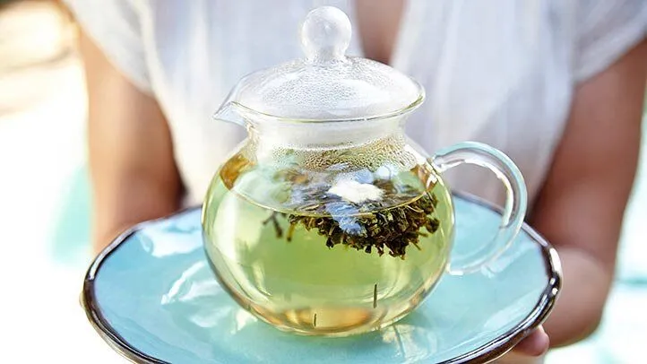 green tea in a glass tea pot
