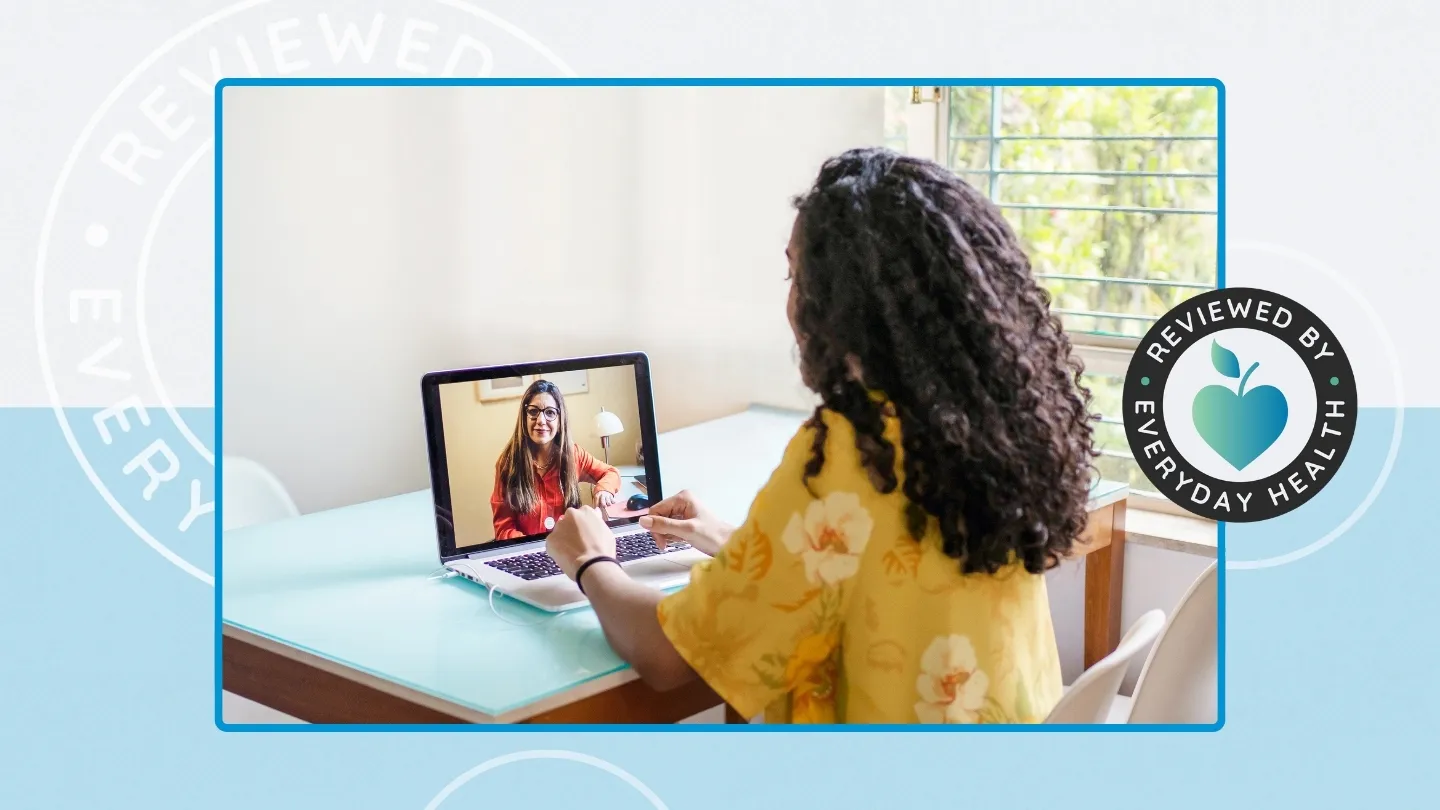 Young woman talking to therapist online