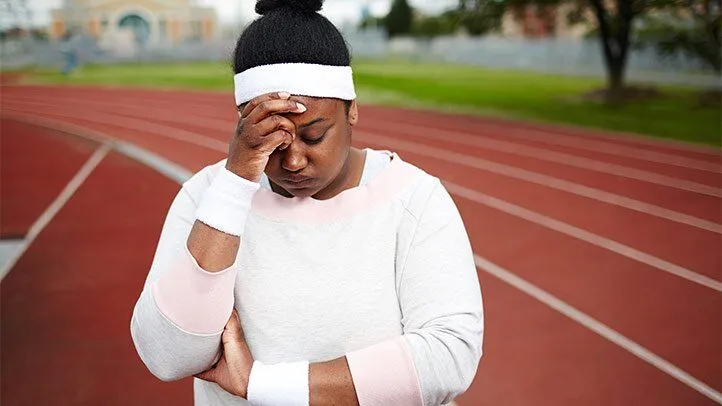 a woman upset after exercising