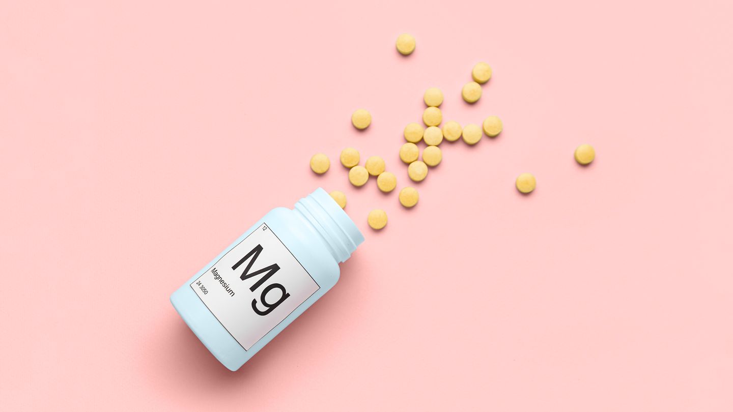 magnesium pills spilling out of a bottle