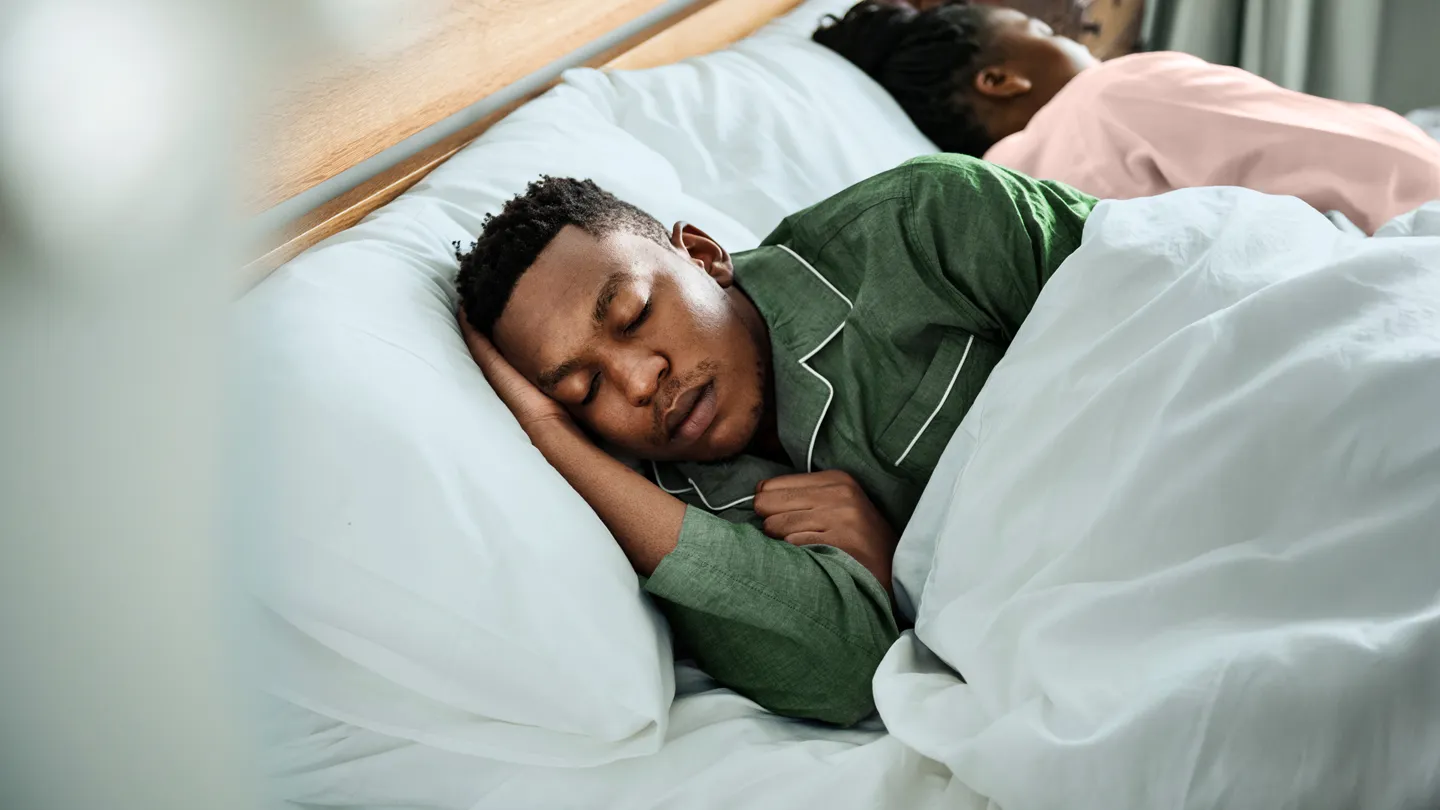 couple sleeping in bed