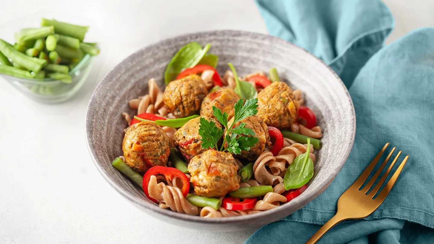 Whole wheat pasta with vegetables and ground turkey or vegetarian meatballs