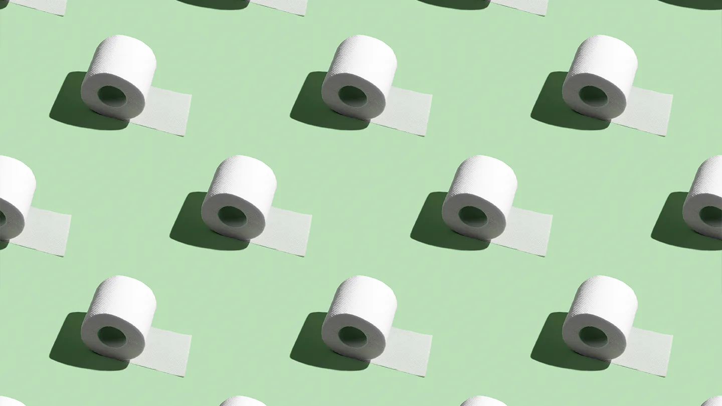 toilet paper repeating on a green background