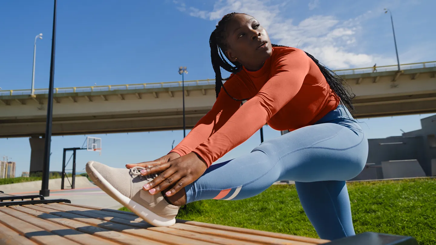 woman stretching before exercise