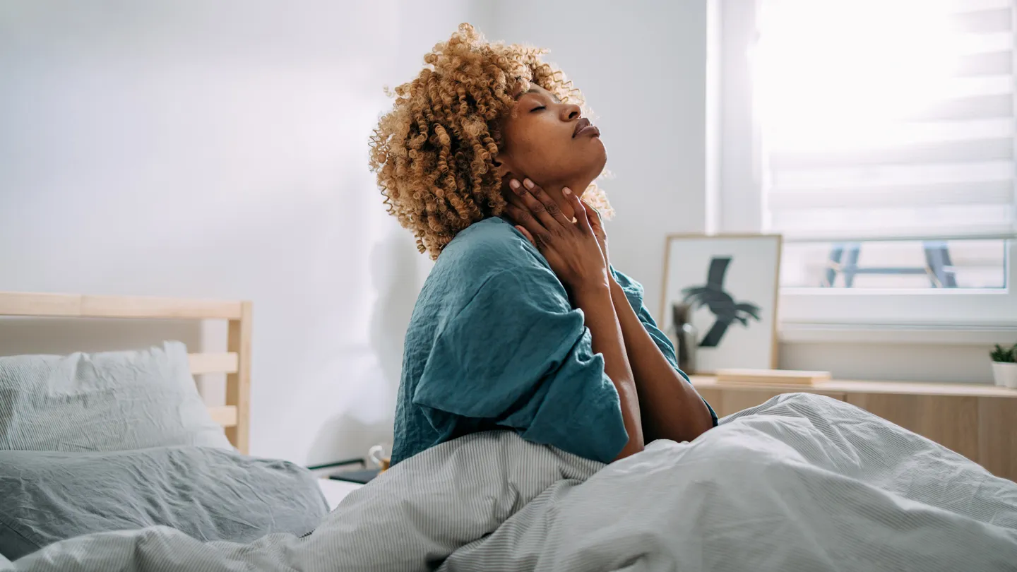 mature woman dealing with effects of insomnia