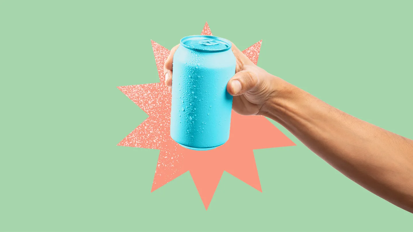 hand holding soda can