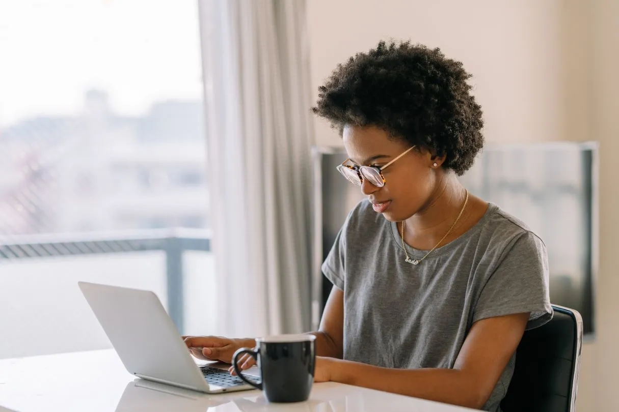 person at home using laptop