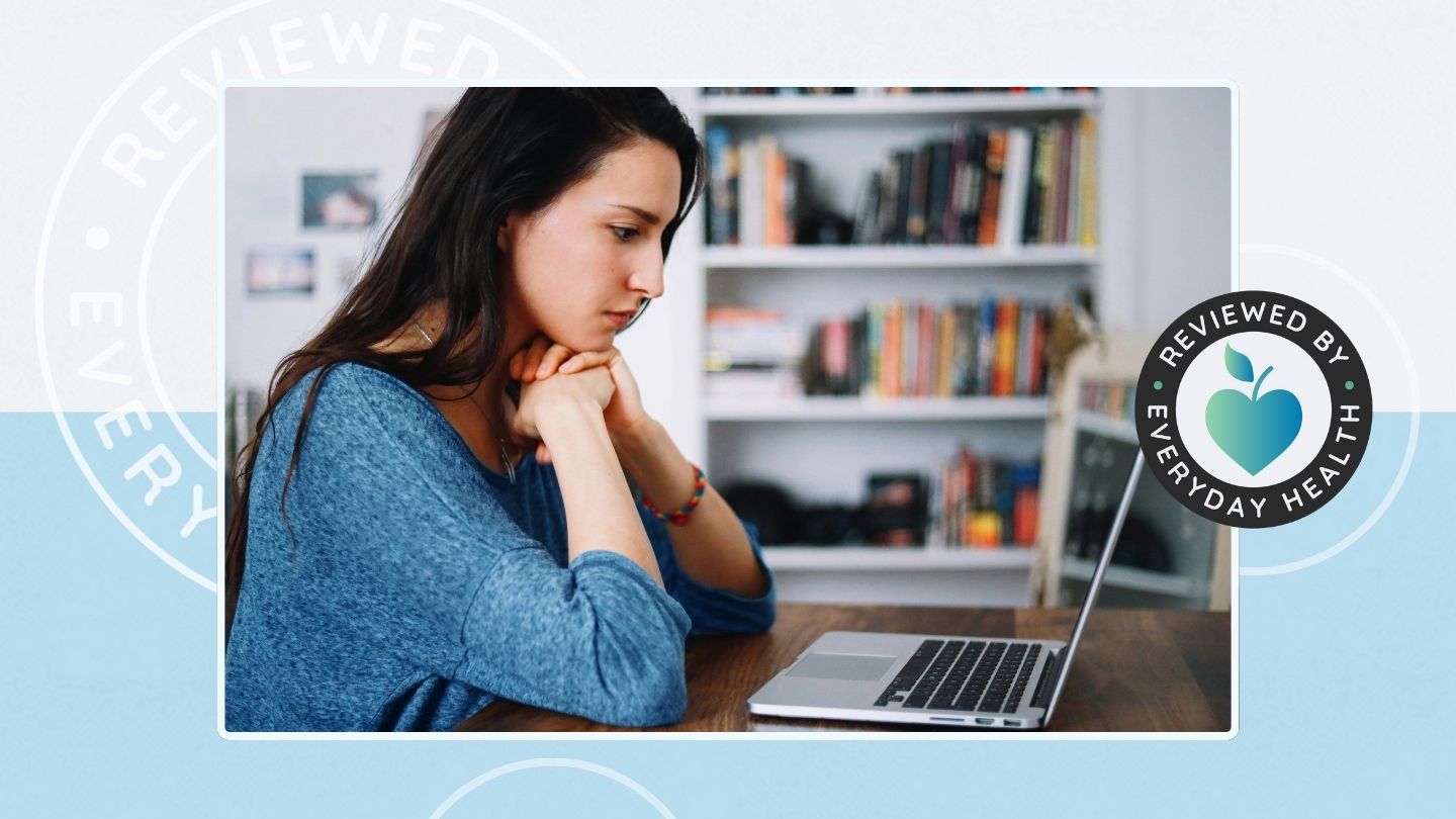 Young woman on laptop at home