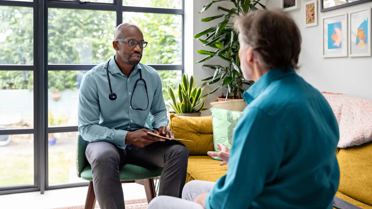 man speaking with his doctor