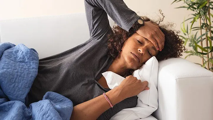 a woman with a cold