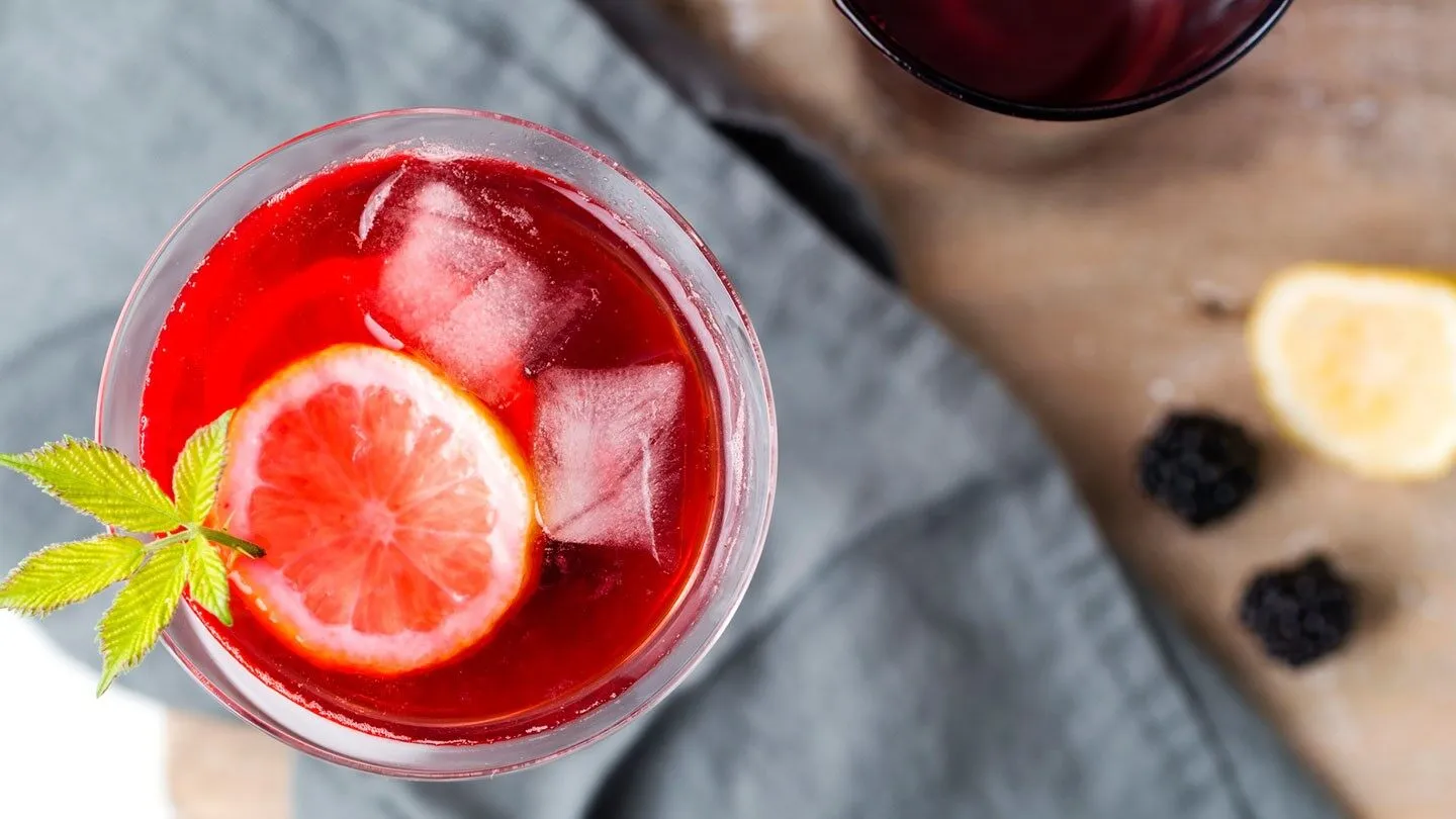 a glass of juice with seltzer