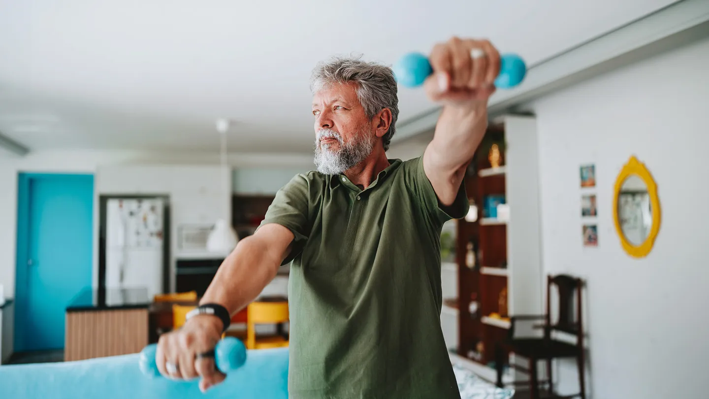 older man working out inside