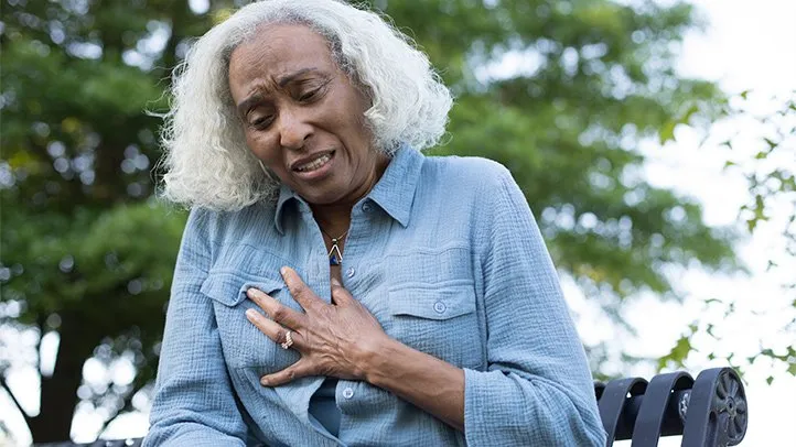 a woman experiencing symptoms of heart failure