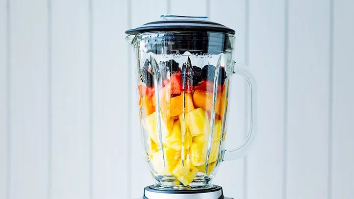 fruit in a blender to make a smoothie for someone following the body reset diet