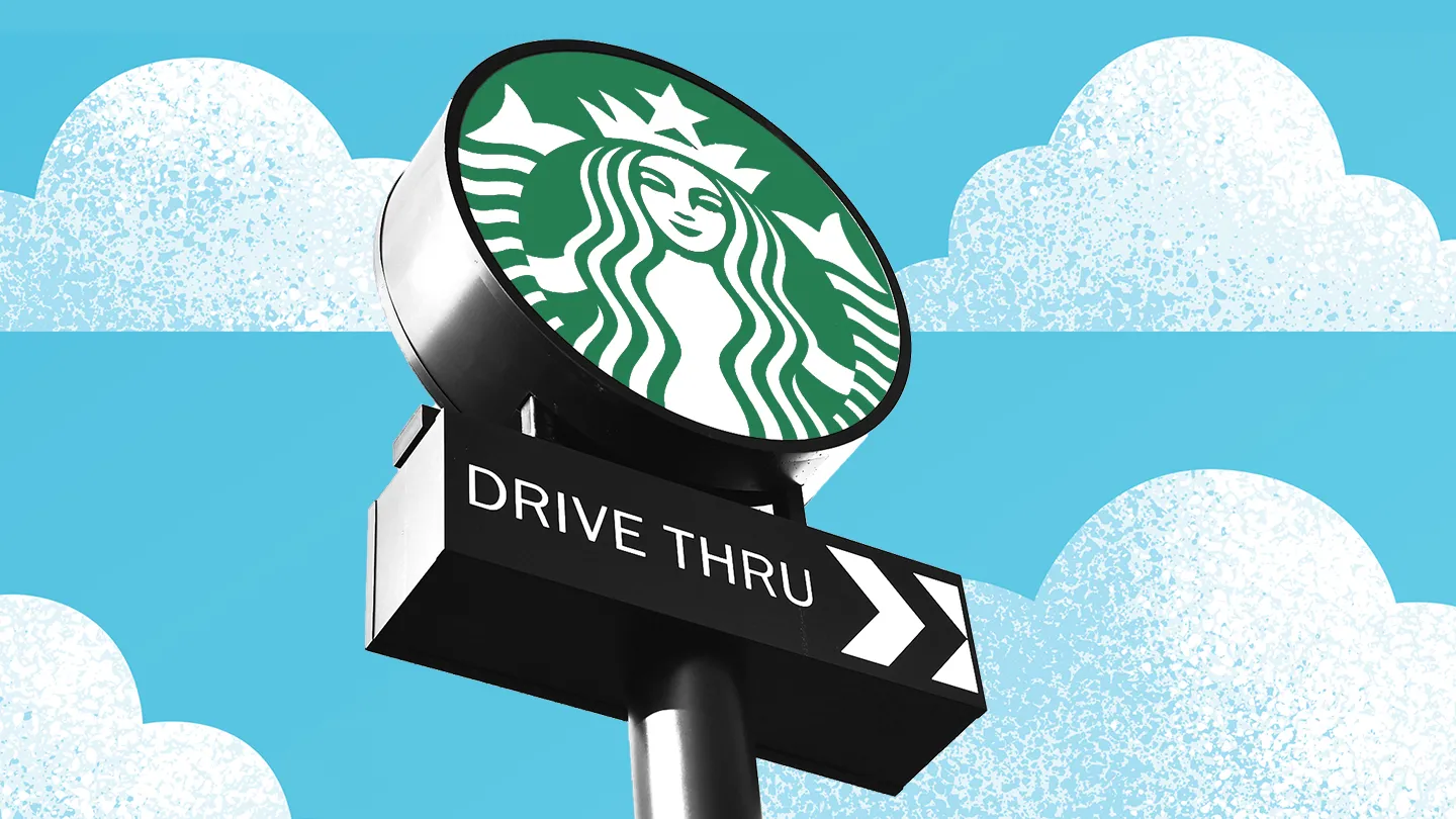 Starbucks-drive-thru sign blue sky clouds
