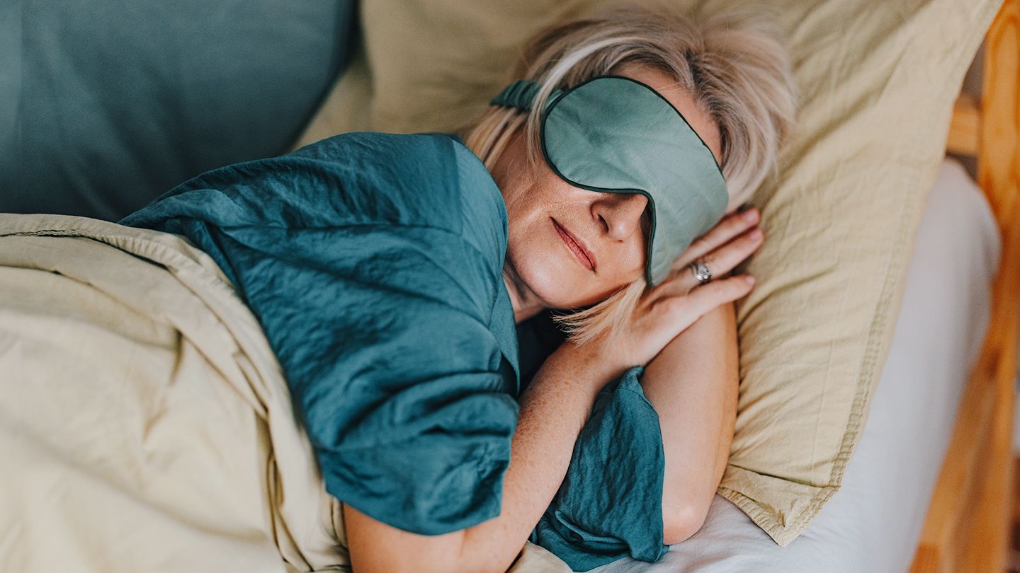 woman sleeping with eye mask