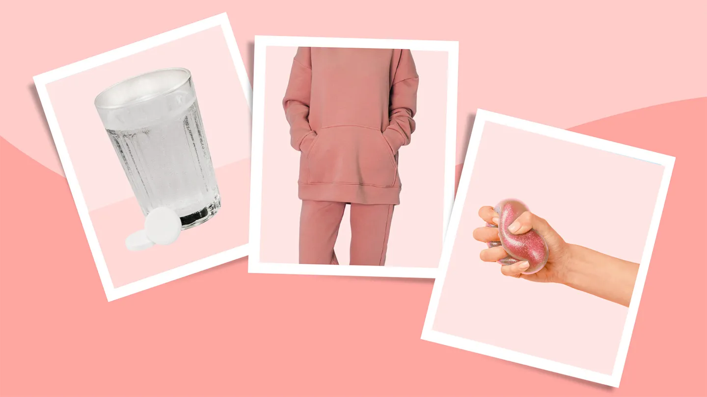 glas of water with antacids woman wearing coral loose clothing sweatpants hand squeezing stress ball