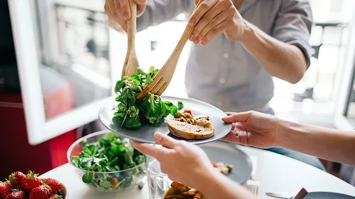 a person eating healthy portions