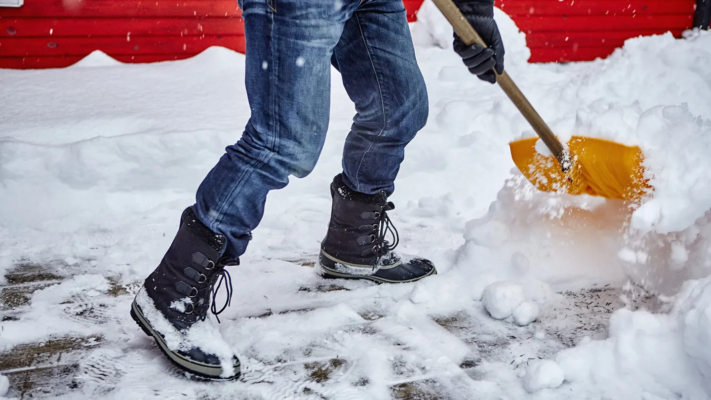 shoveling snow after blizzard snow storm