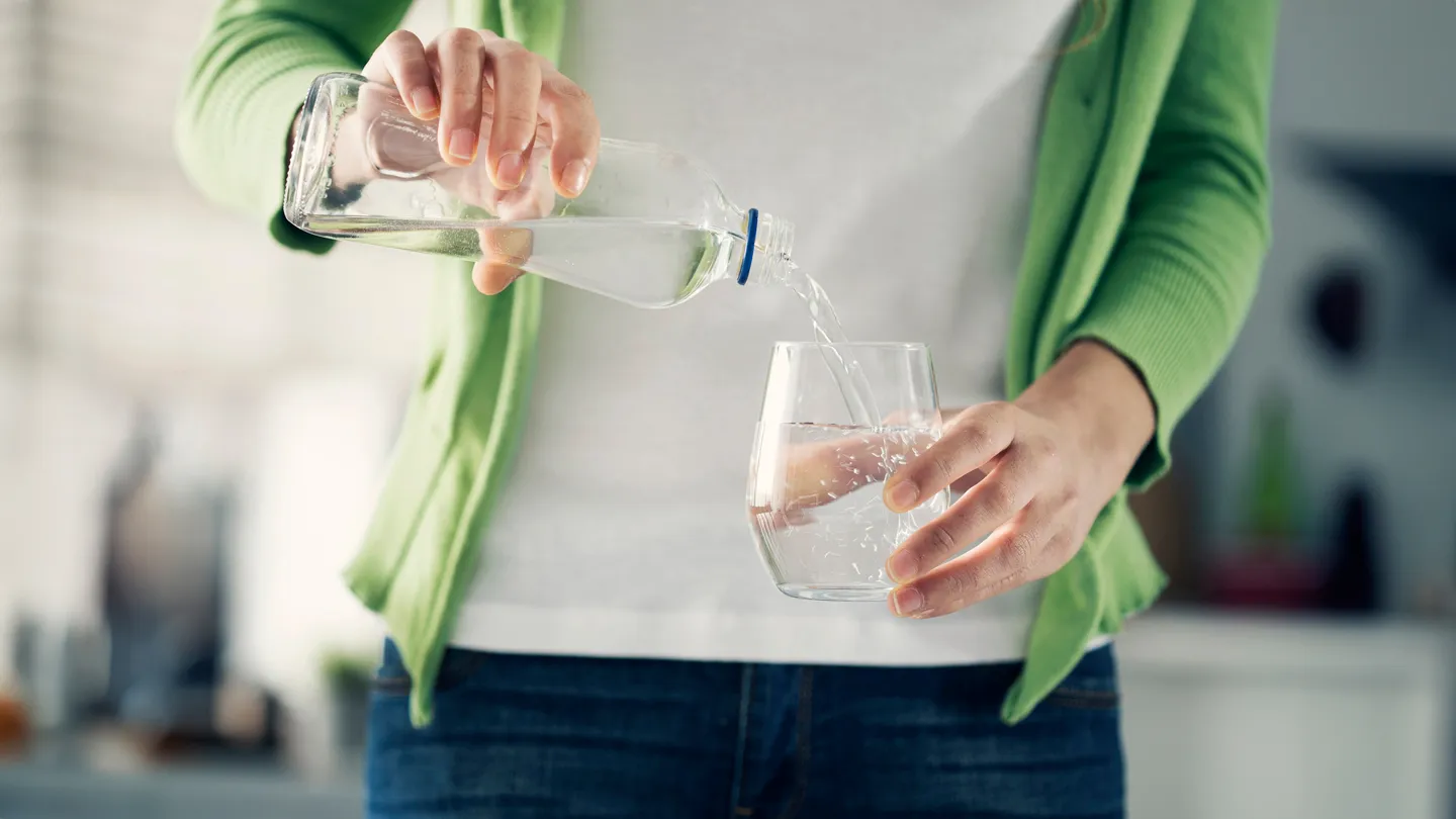 woman drinking alkaline water