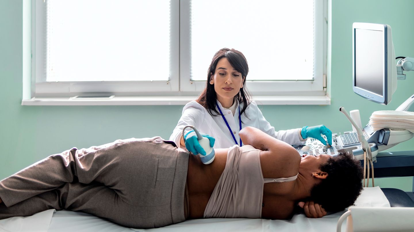 woman getting an ultrasound of her liver diagnosis
