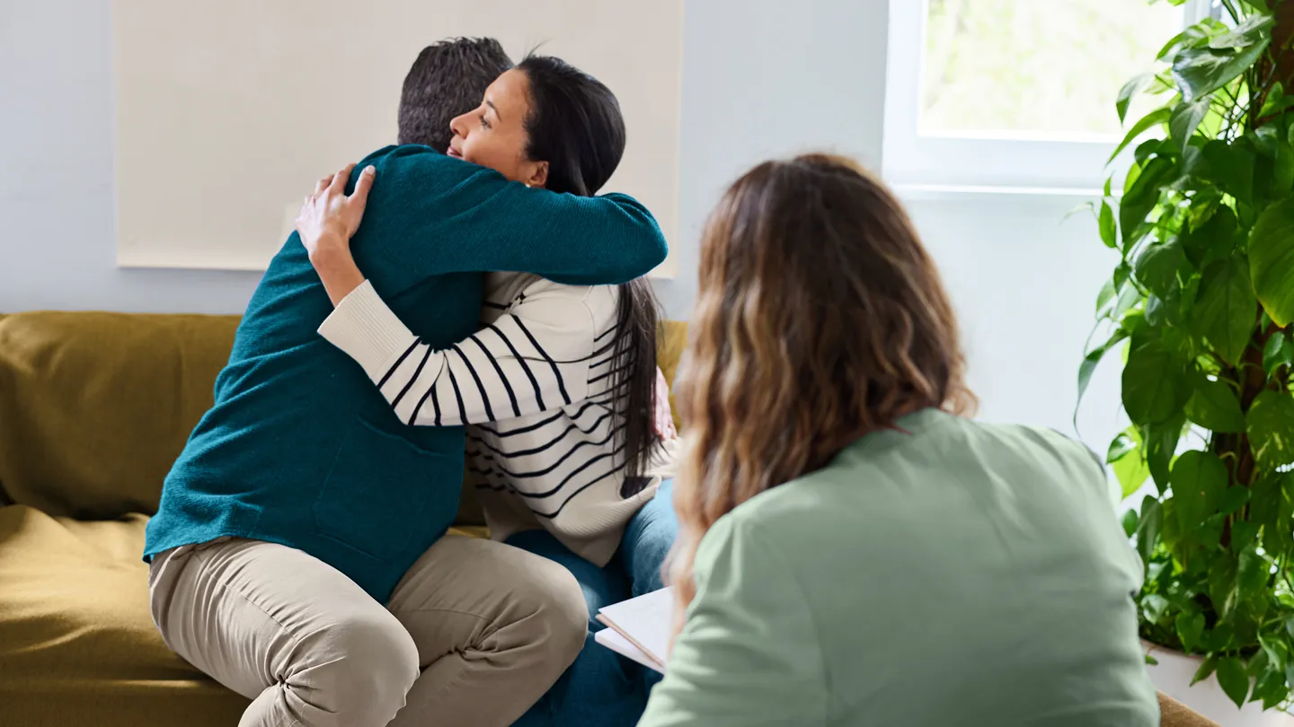 couple embracing during sex therapy session