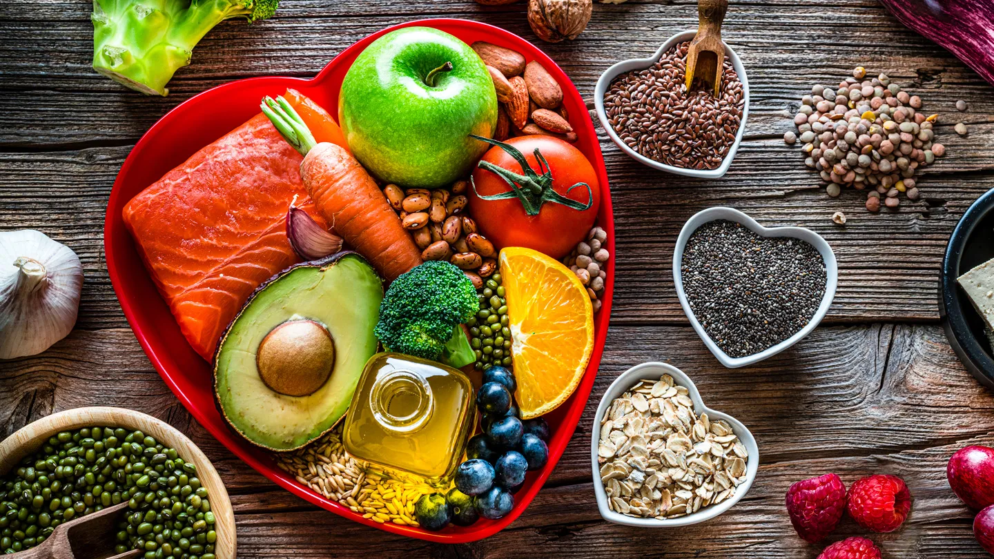 Healthy food for lower cholesterol and heart care shot on wooden table dash diet