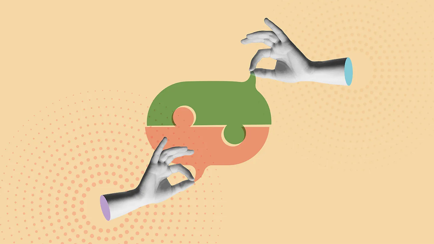 two hands holding two colors of puzzle locked speech bubbles